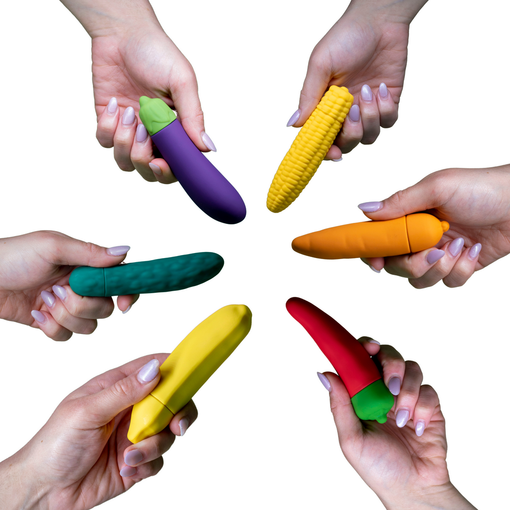 Vegantoys , sex toys , vibrators , women holding vibrator
